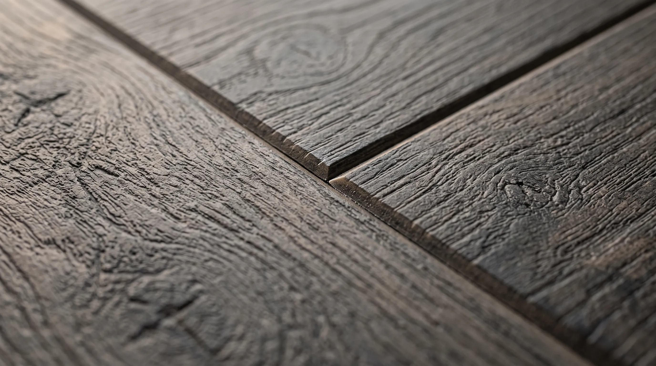 Macro photograph of luxury vinyl plank showing embossed grain and a bevelled edge